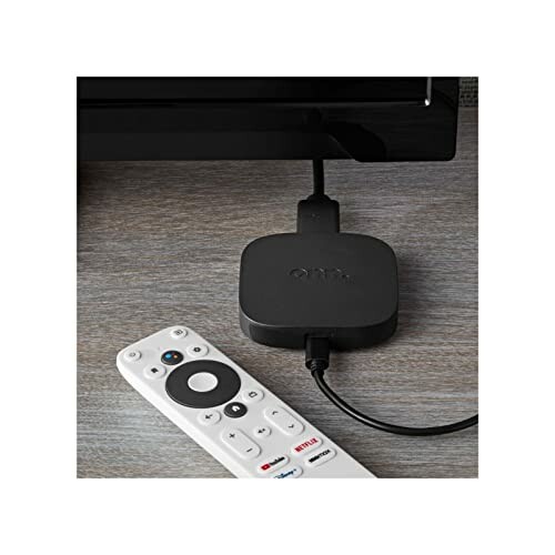 Streaming device connected to TV with remote control