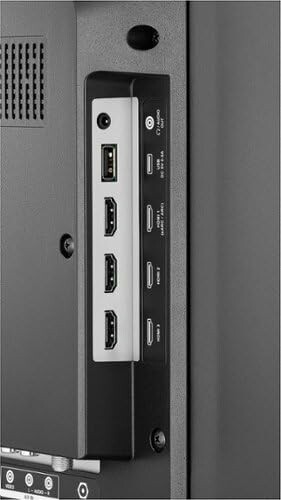 Close-up of TV back panel with HDMI and USB ports.